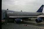(N175UA B747-422) UA919 from LHR to IAD disembarking. This aircraft is leased to United Airlines by the Wilmington Trust Company, and is powered by 4 Pratt & Whitney PW4000 engines. It w ...