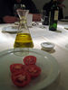 Andrew > Pane con tomate, partial ingredients.  One of many appetizers at Bestiari.