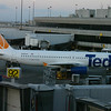 Andrew > N465UA - Ted waiting at Gate 75, viewed from the international terminal