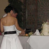 Andrew > Sarah and Ryan cut the cake